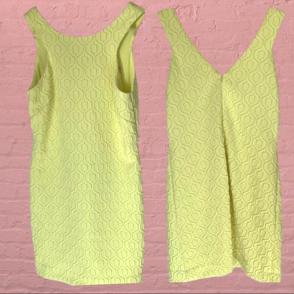 Lilly Pulitzer yellow mini dress with silver accent threading in the pattern.